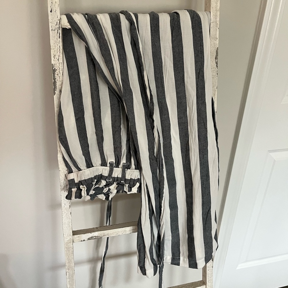 Blue and white striped paper bag type pants